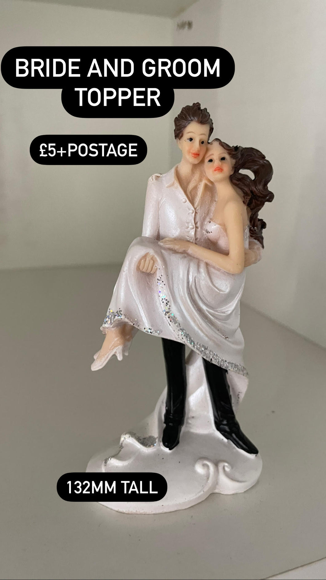 Cake topper Bride and Groom (bride in grooms arms)