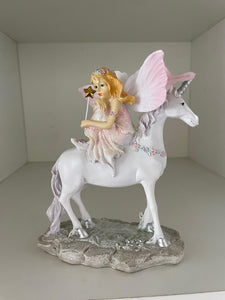Cake topper:  Fairy girl on Unicorn