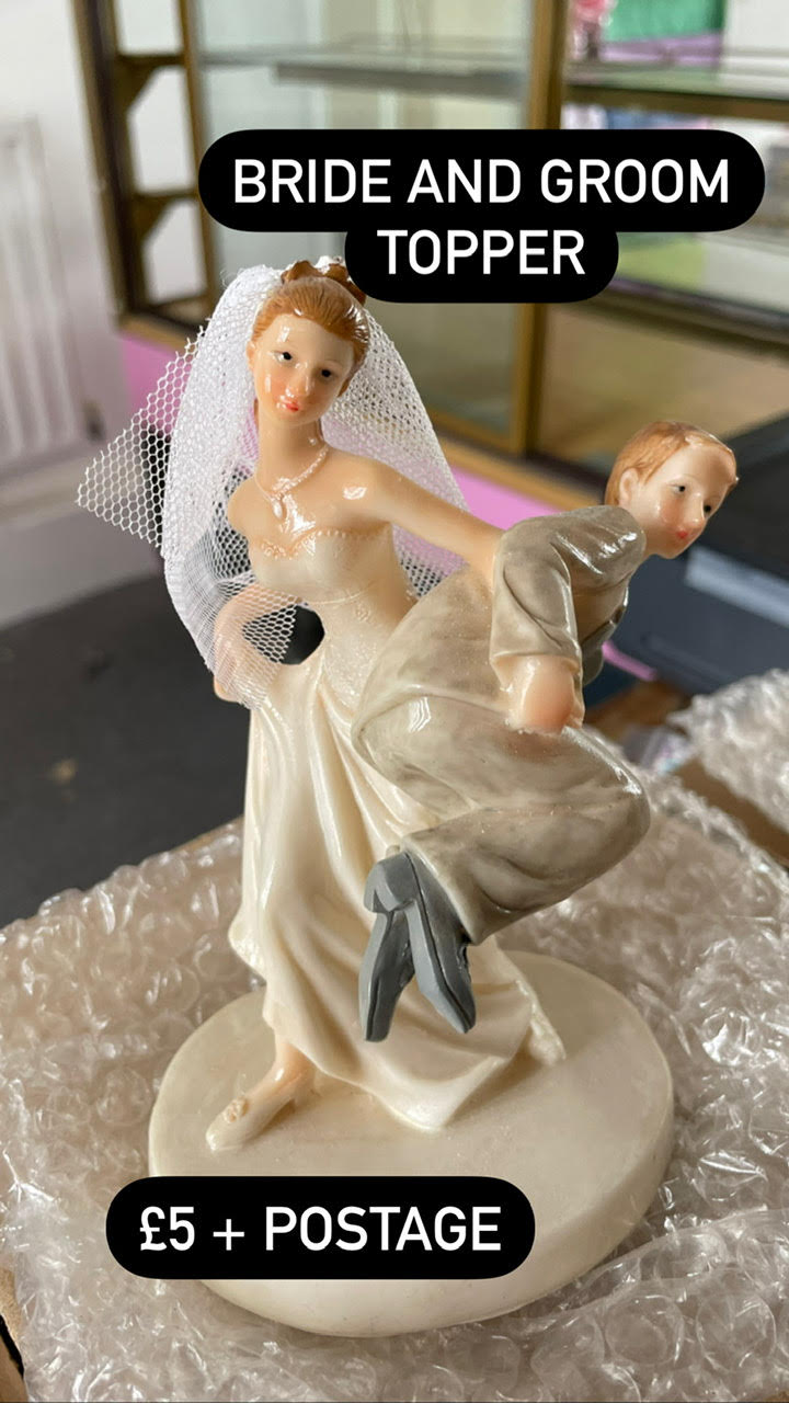 Cake topper Bride and Groom (bride carrying groom)